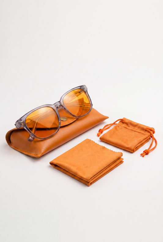 Wavelength Evening Lens with its tan leather case, drawstring pouch and microfiber cloth