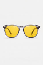 Wavelength Day Lens — yellow-tint blue light glasses, front view on white