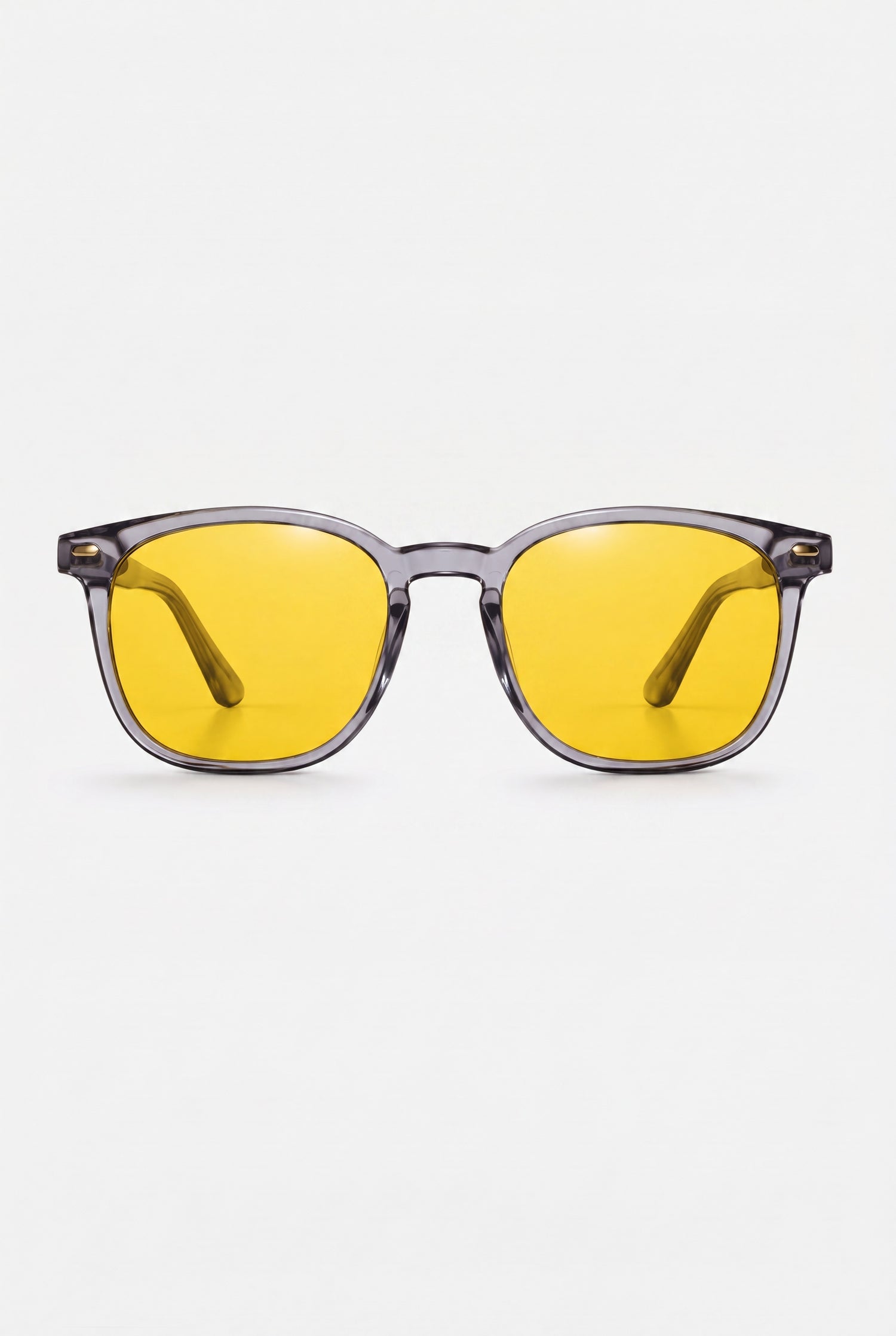Wavelength Day Lens — yellow-tint blue light glasses, front view on white